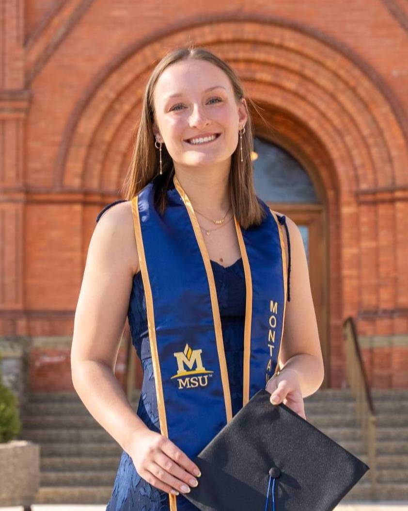 Emily H Graduation in front of Montana Hall
