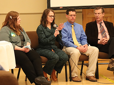 Faculty panel talking 