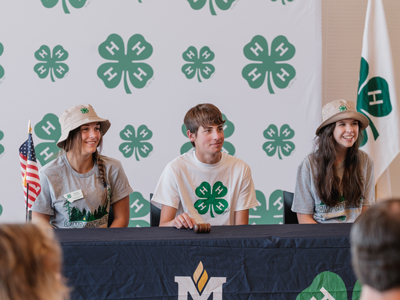 4-H members at a table