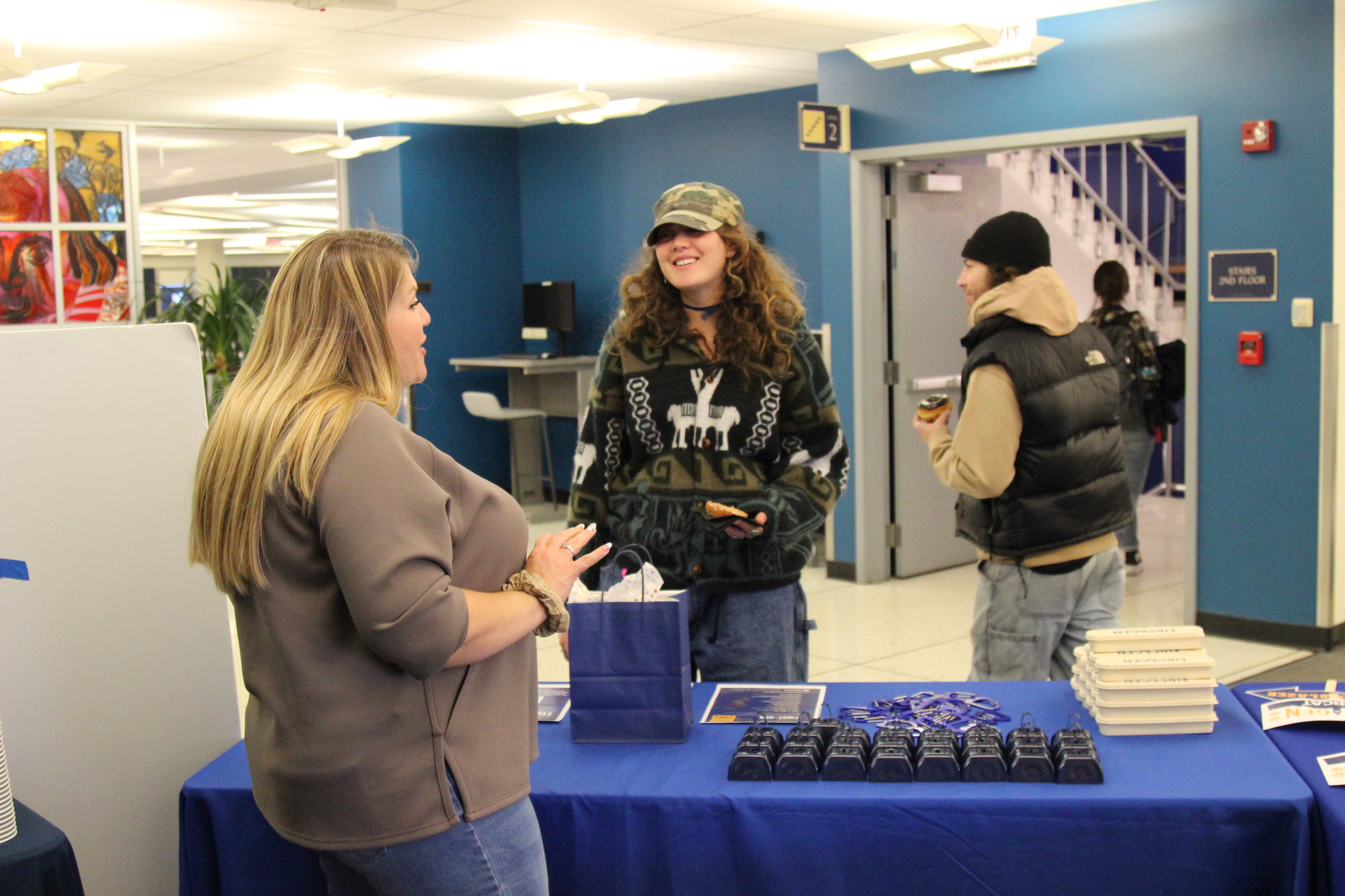 Alisha Talking to Student