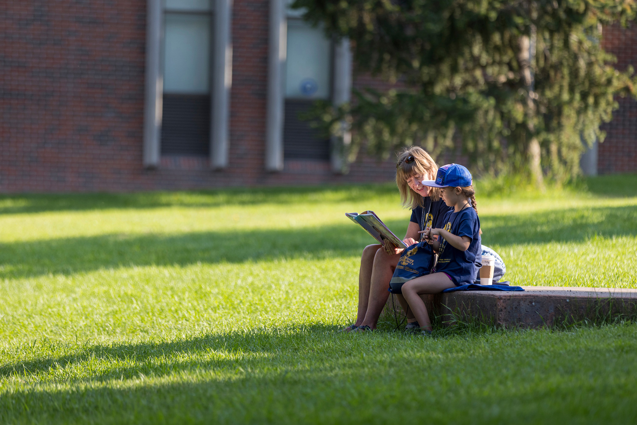 woman and child reading