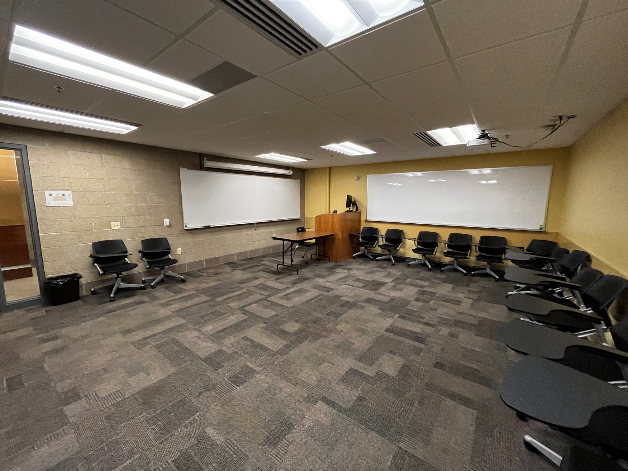 Gaines 144 a small flat classroom taken from the rear corner.