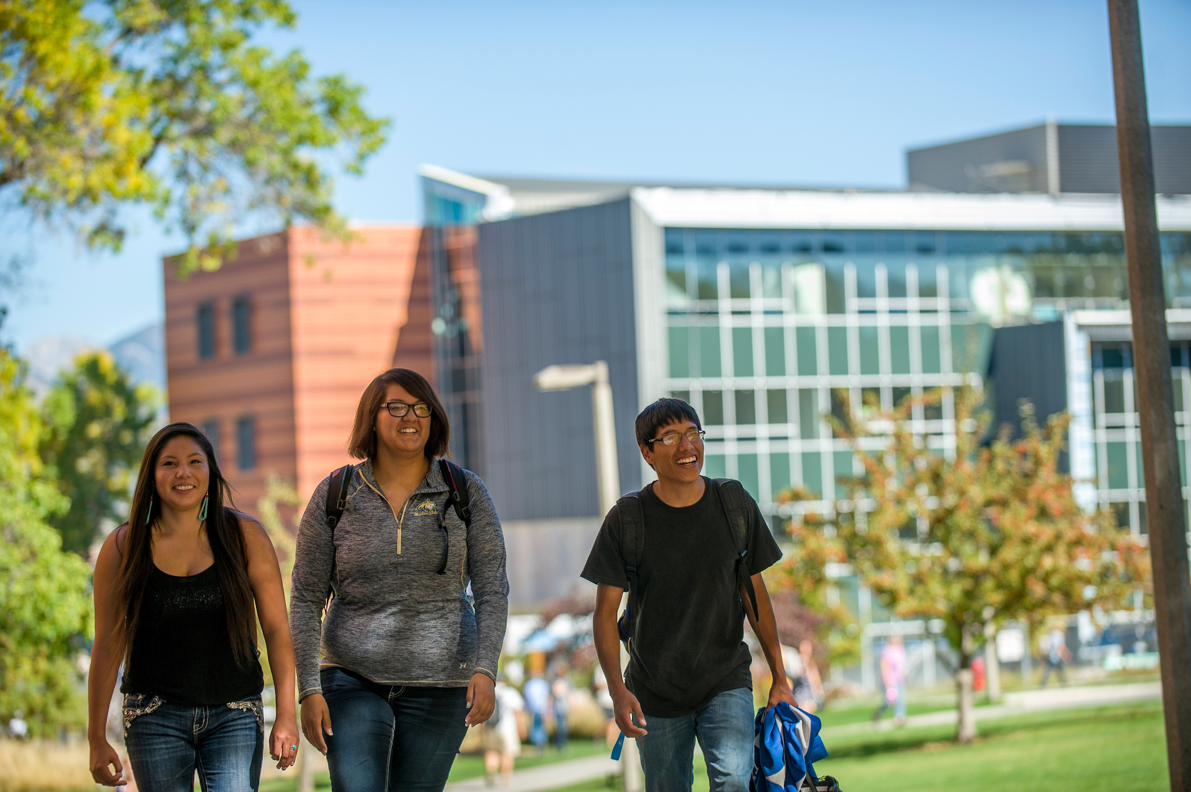 Students walking in front of building