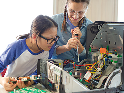 girls working on electronics