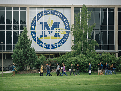 Prospective students on a campus tour outside the MSU Library